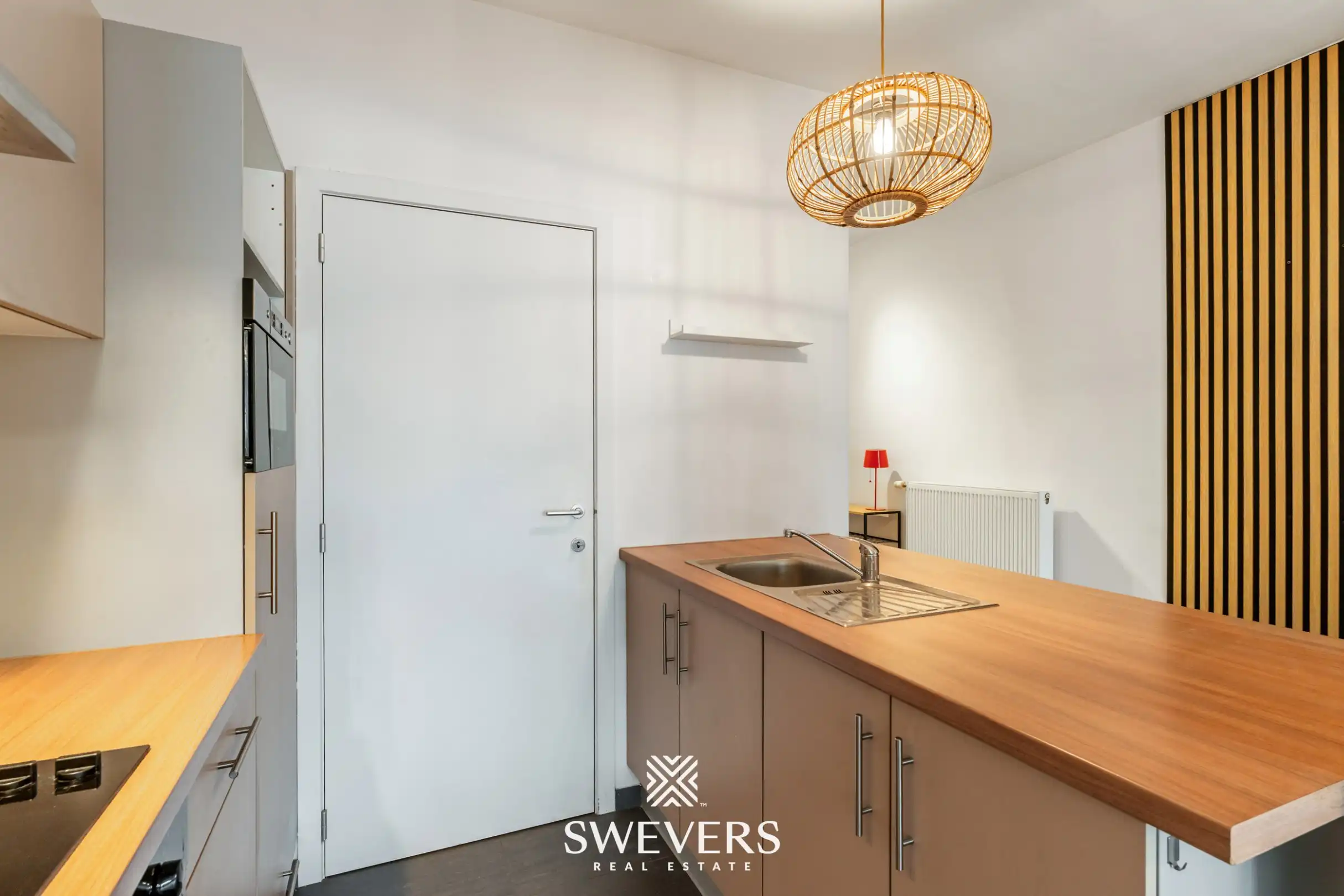 Instapklaar, gelijkvloers appartement met ruim terras en groen zicht in Hasselt foto 11