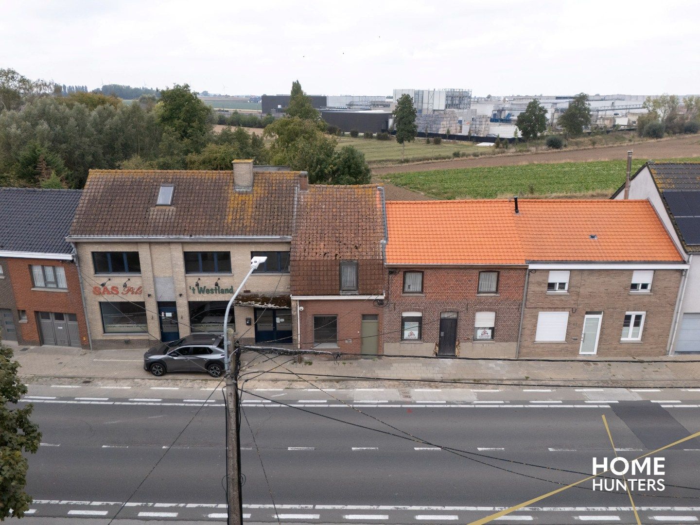 Te renoveren woning met 3 slaakamers en een zonnige tuin foto 3