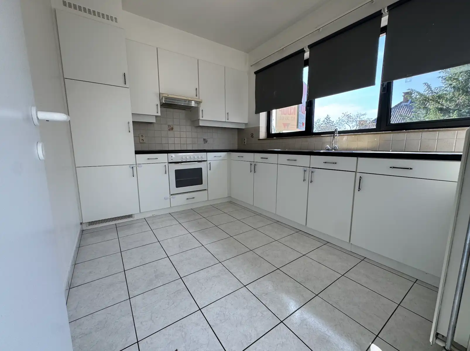 Instapklaar appartement met 2 slaapkamers én garage! foto 10