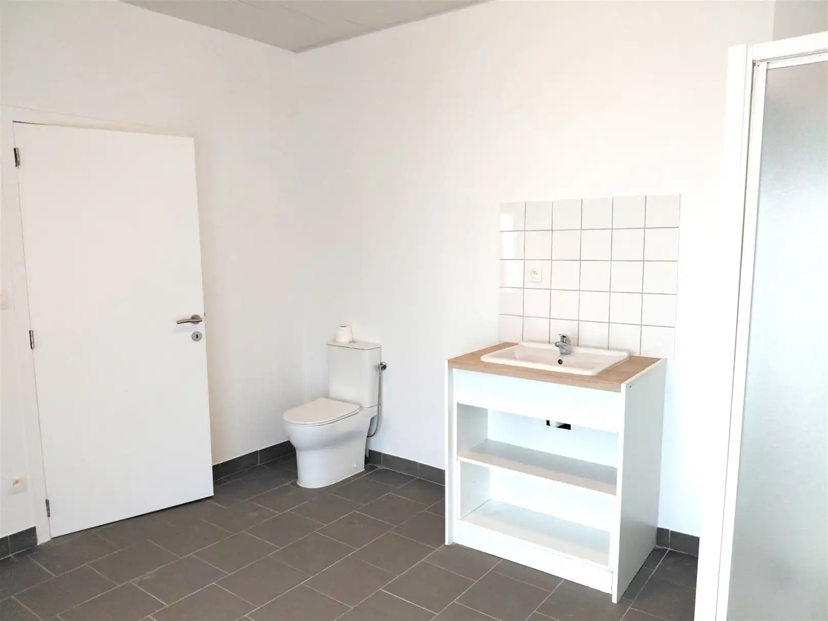 TE HUUR: Gesloten bebouwing met 2 slaapkamers in het centrum van Heusden! foto 11