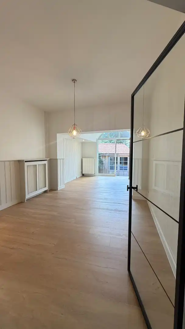 Instapklare trapgevelwoning met zonnig terrastuintje en grote berging, centrum, rustige straat omgeving ’t Zand foto 4