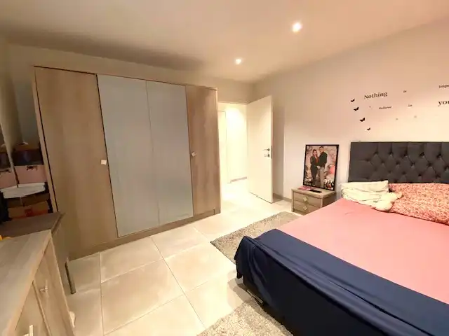 Recent ideaal gelegen volledig gerenoveerd appartement HARTJE Geel 2 slpk, met autostaanplaats foto 8