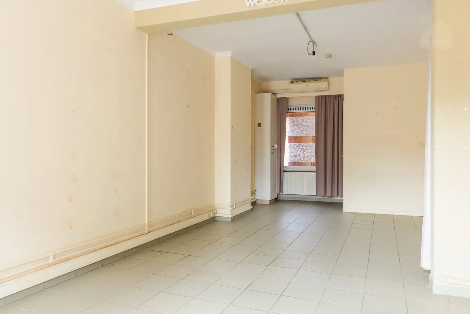 Woning met 3 slaapkamers en 4 garages in het centrum van Meerhout foto 3