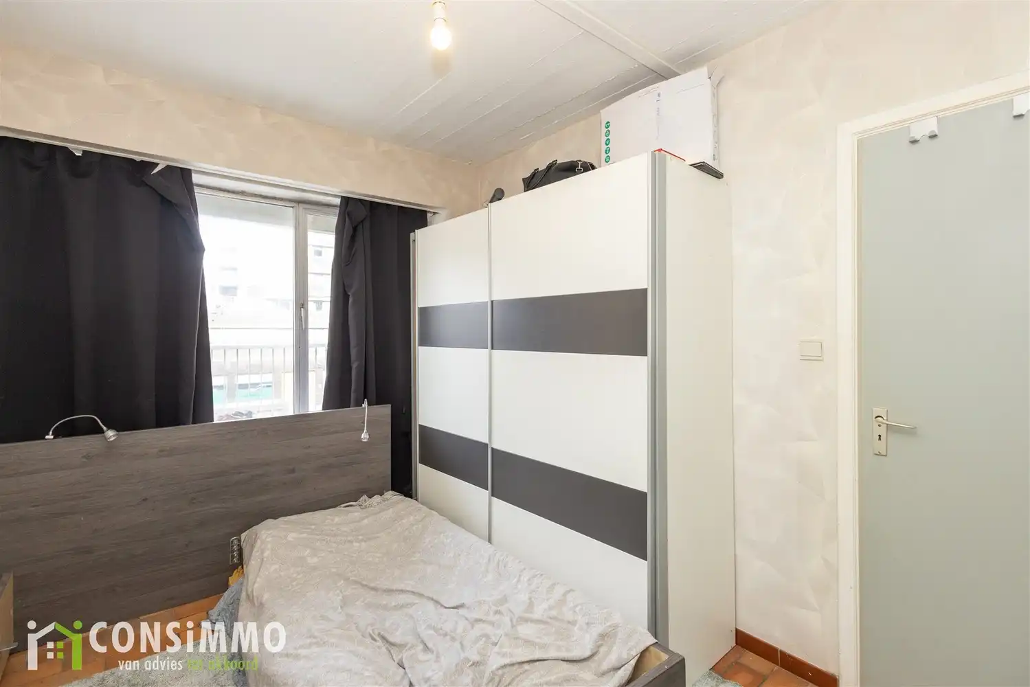 Appartement met ruim terras en 2 slaapkamers in het centrum van Genk foto 16