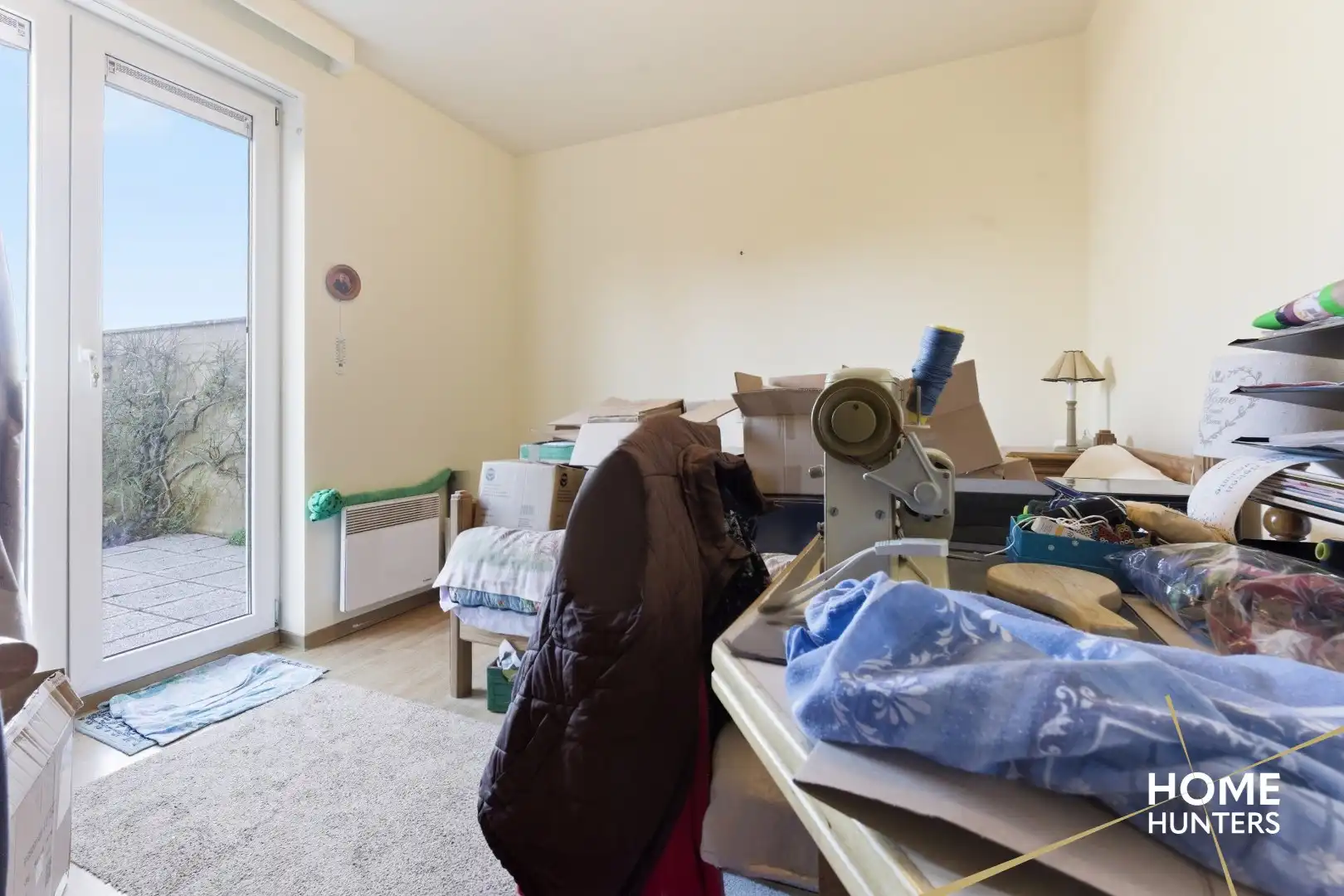 Instapklaar gelijkvloers appartement met 2 slaapkamers en ruime tuin foto 15
