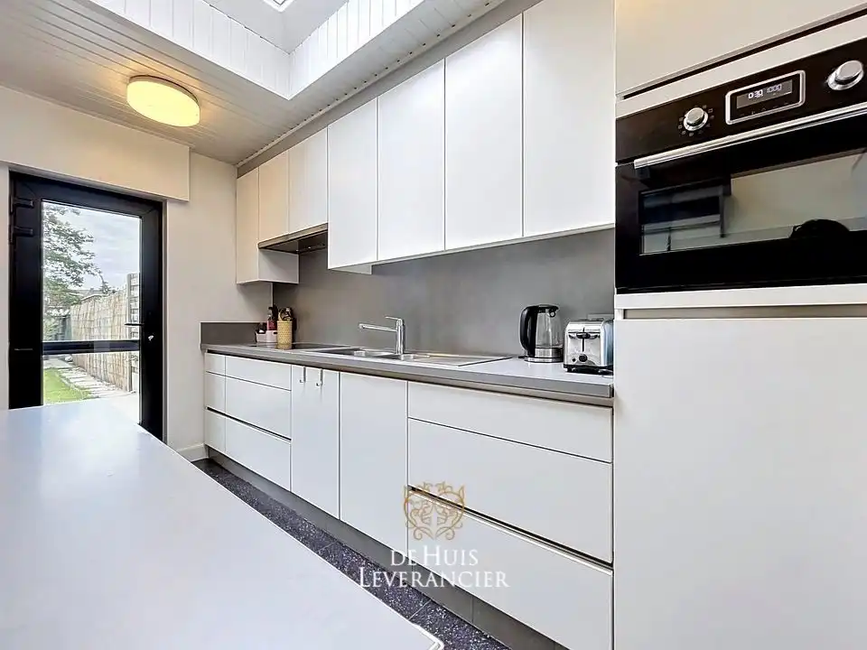 Instapklare rijwoning met tuin op rustige ligging te koop in Lint foto 6