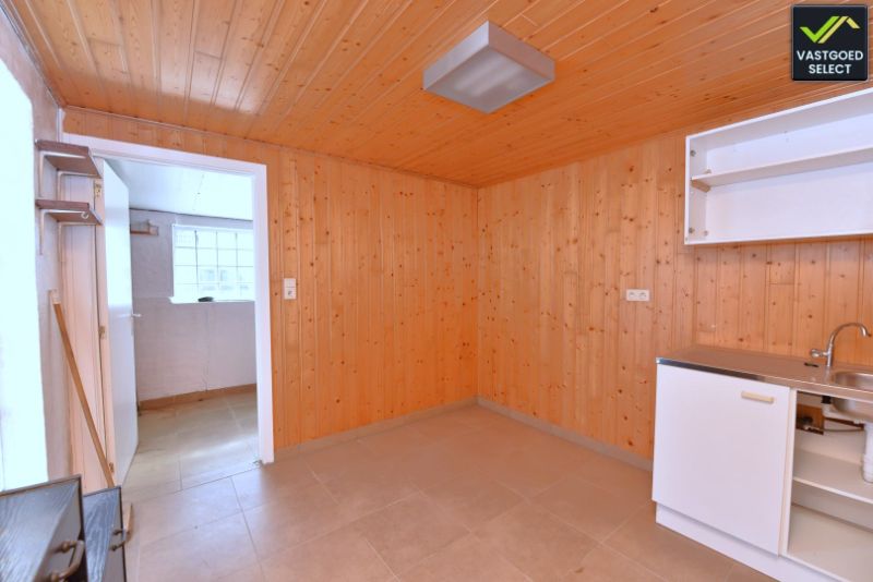 Vastgoed Select: Rijwoning met westgerichte tuin, open zicht, garage en 2 slaapkamers in Eeklo foto 12