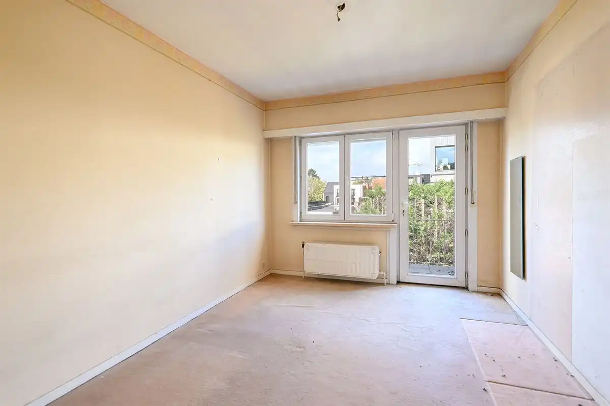 Lichtrijk te renoveren hoekappartement in hartje Brasschaat foto 22