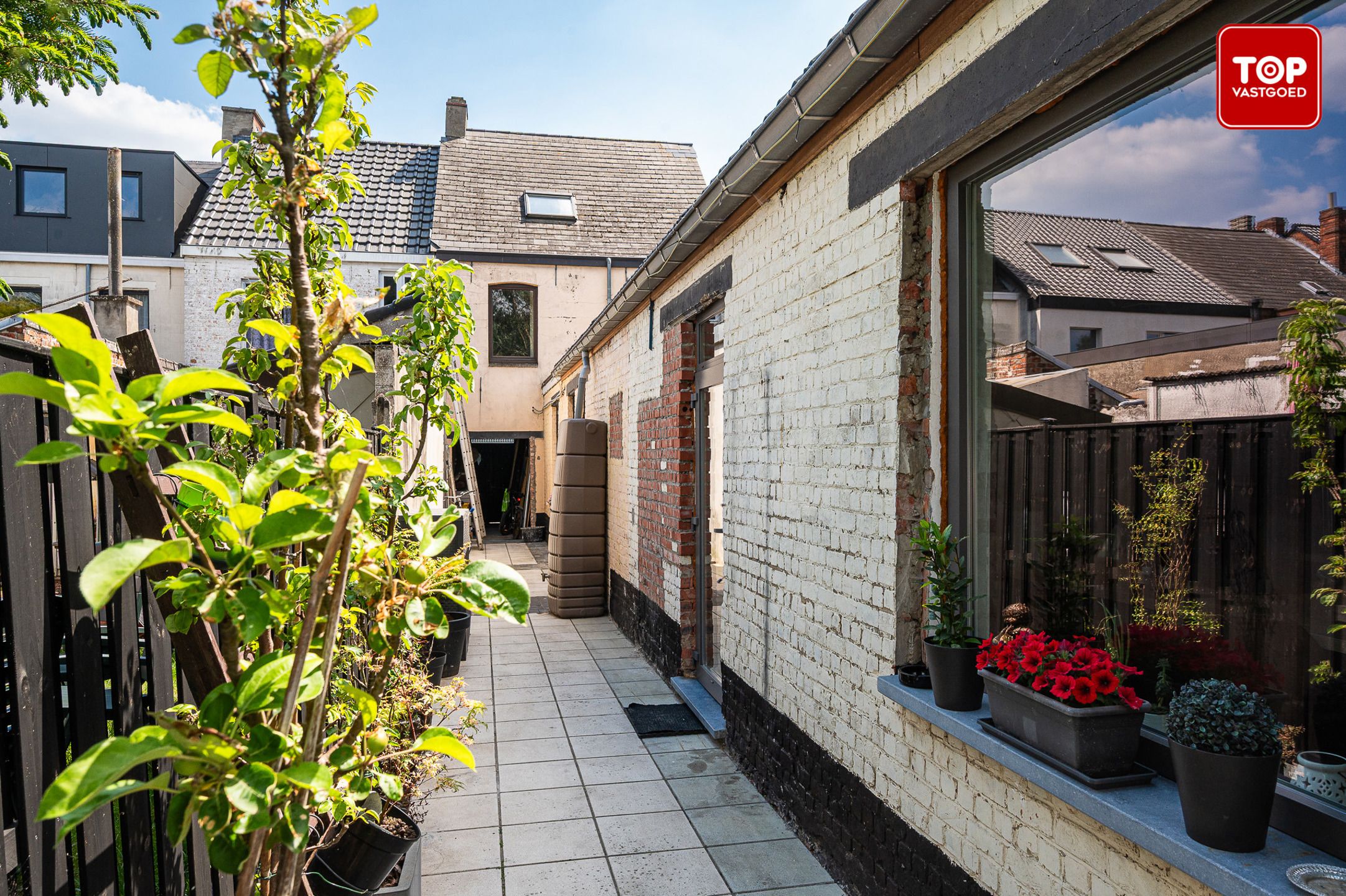 Charmante gezinswoning met tuin in hartje Wetteren foto 29