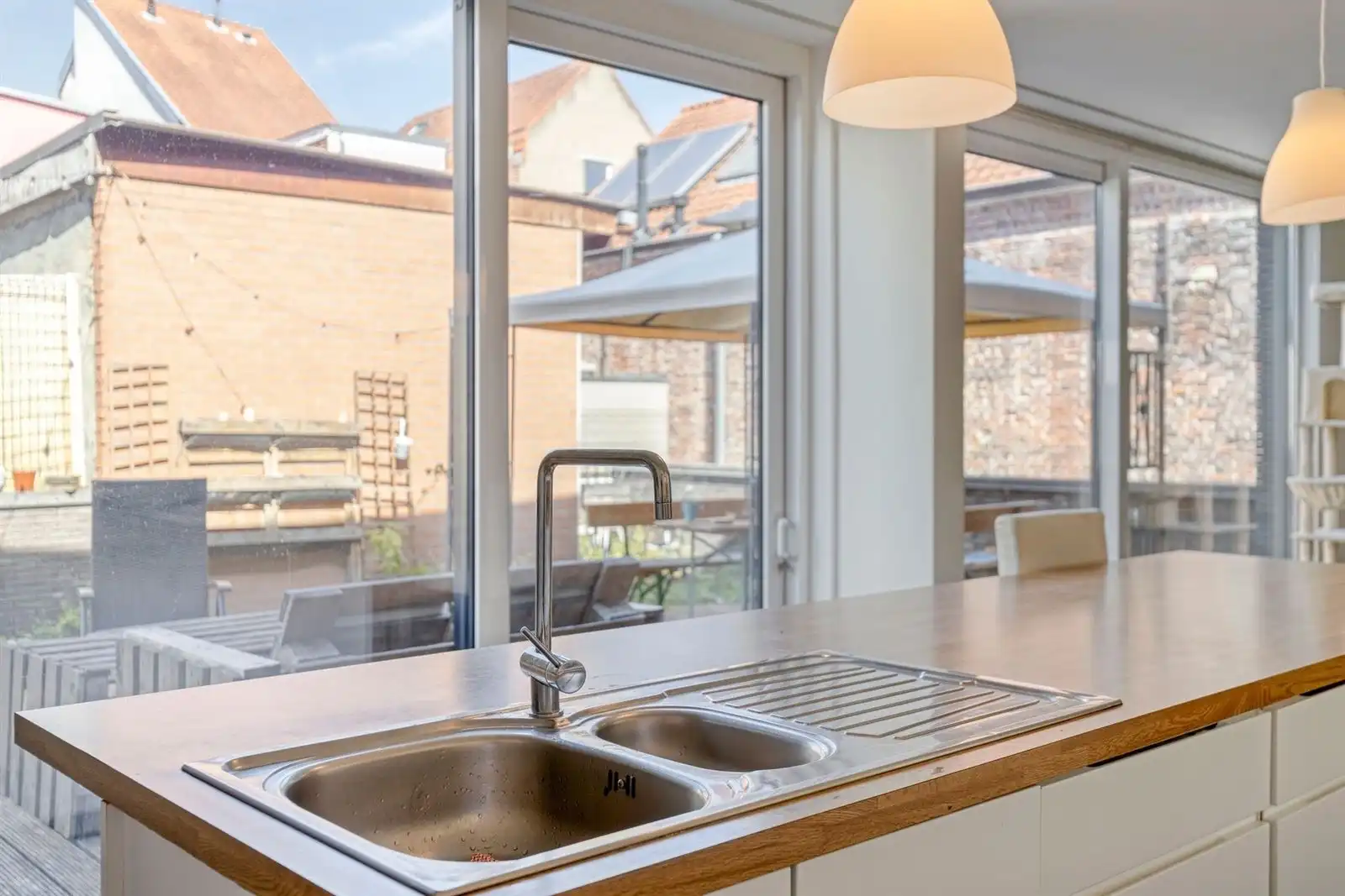 Unieke moderne triplex appt  met ruime garage op toplocatie in een steegje van de Kouter foto 11