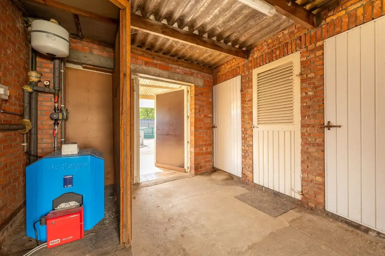 Karaktervolle woning met grote tuin, bijgebouwen en uitbreidbaar zoldervolume op een verrassend diep perceel foto 34