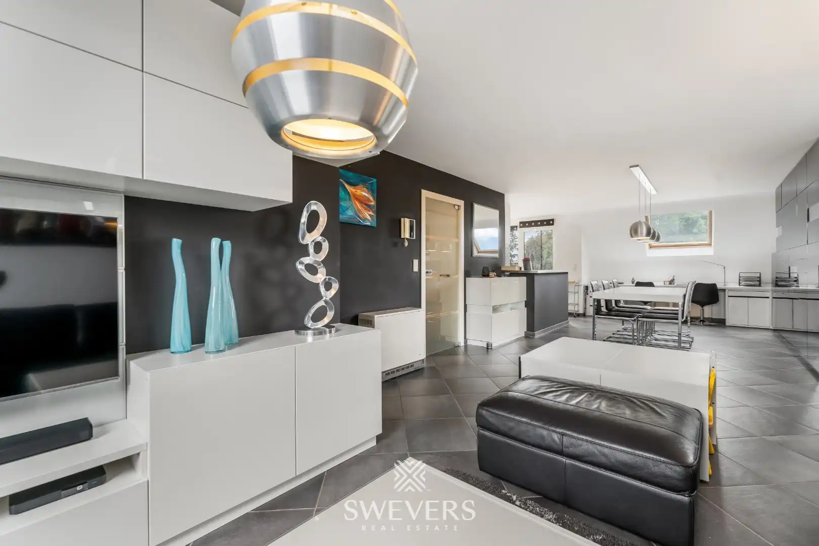 Ruim duplex appartement met 2 slaapkamers en garage foto 4