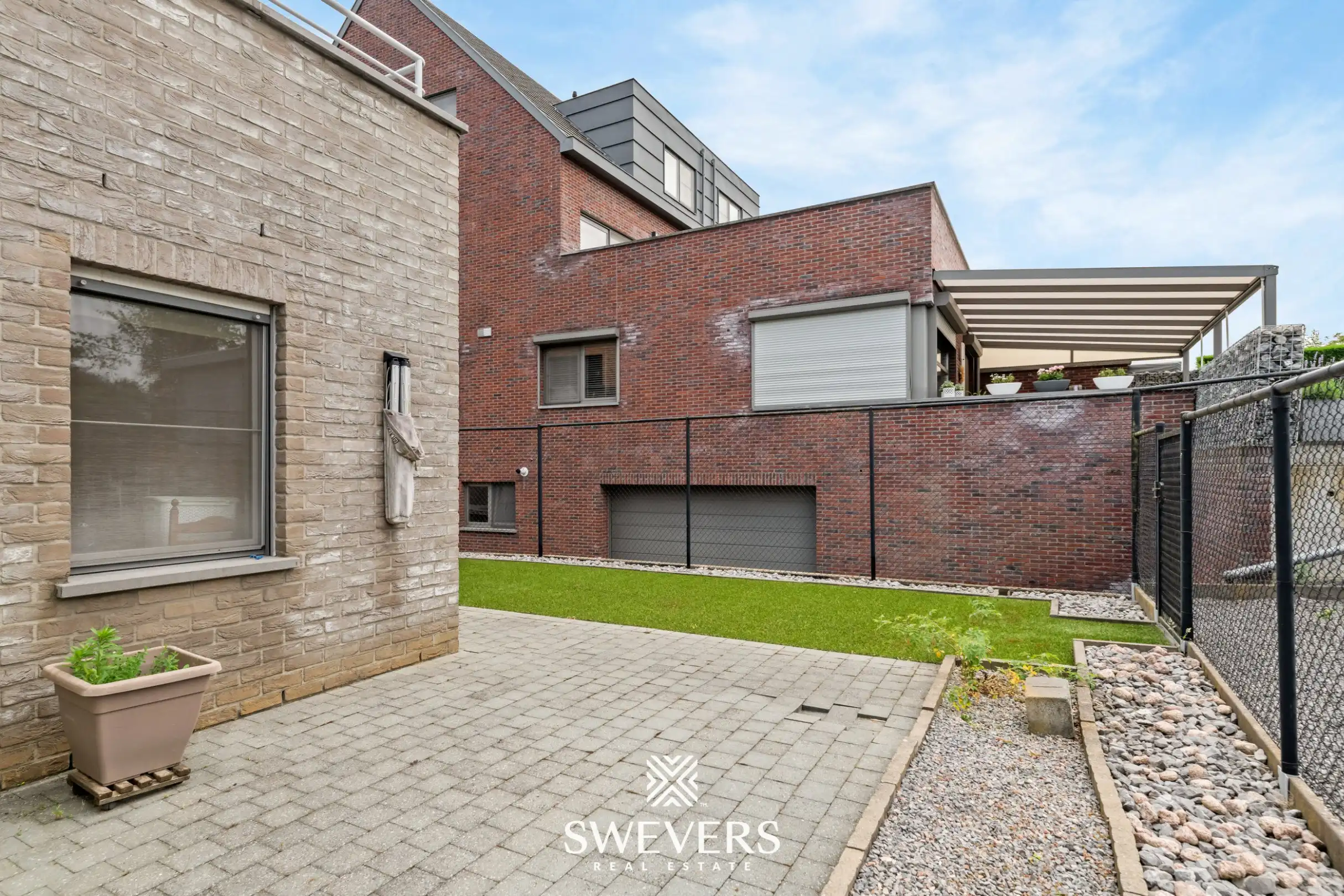 Ruim gelijkvloers appartement met tuin en ondergrondse autostaanplaats foto 29