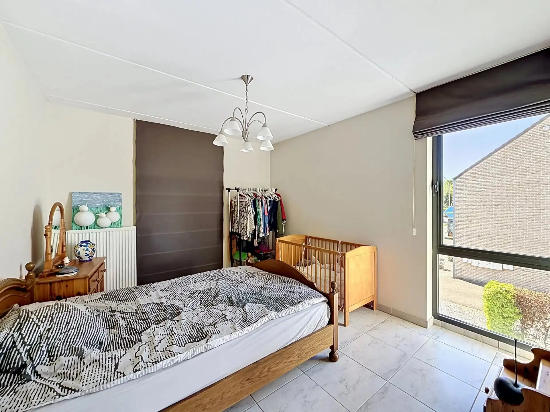 Ruim appartement met 2 slaapkamers, groot terras en staanplaats. foto 11