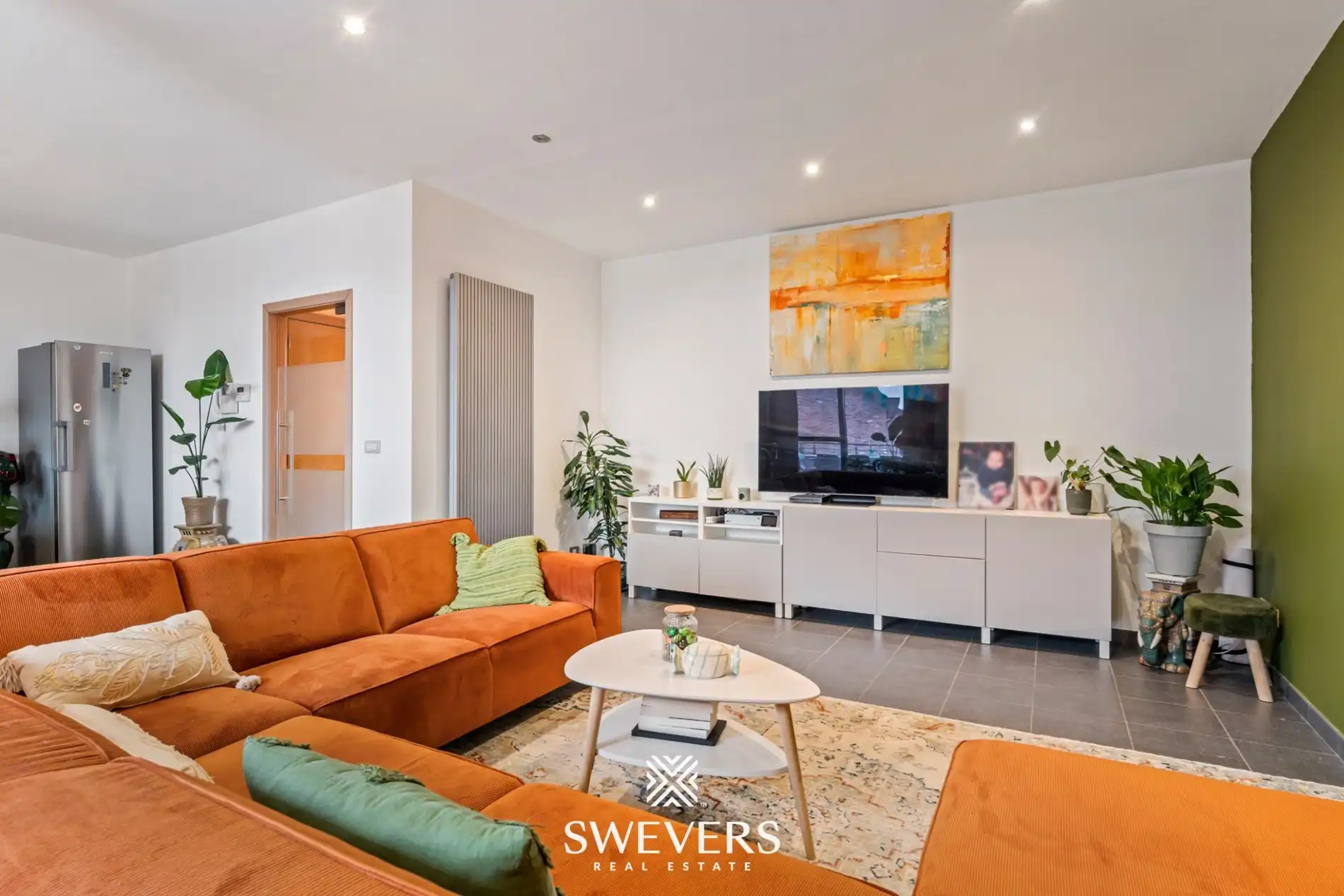 Ruim appartement met dubbele garage en groot terras vlakbij het centrum van Heusden foto 3