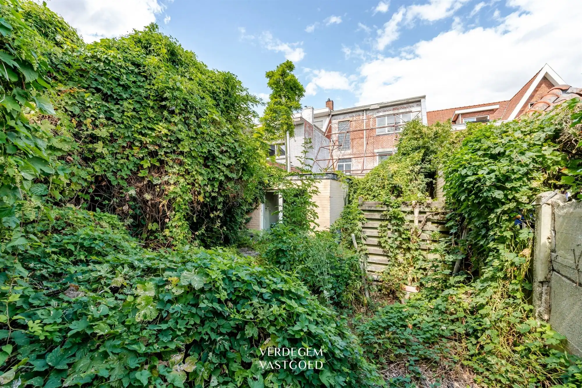 Renovatieproject: centraal gelegen handelspand met woonst en tuin foto 21