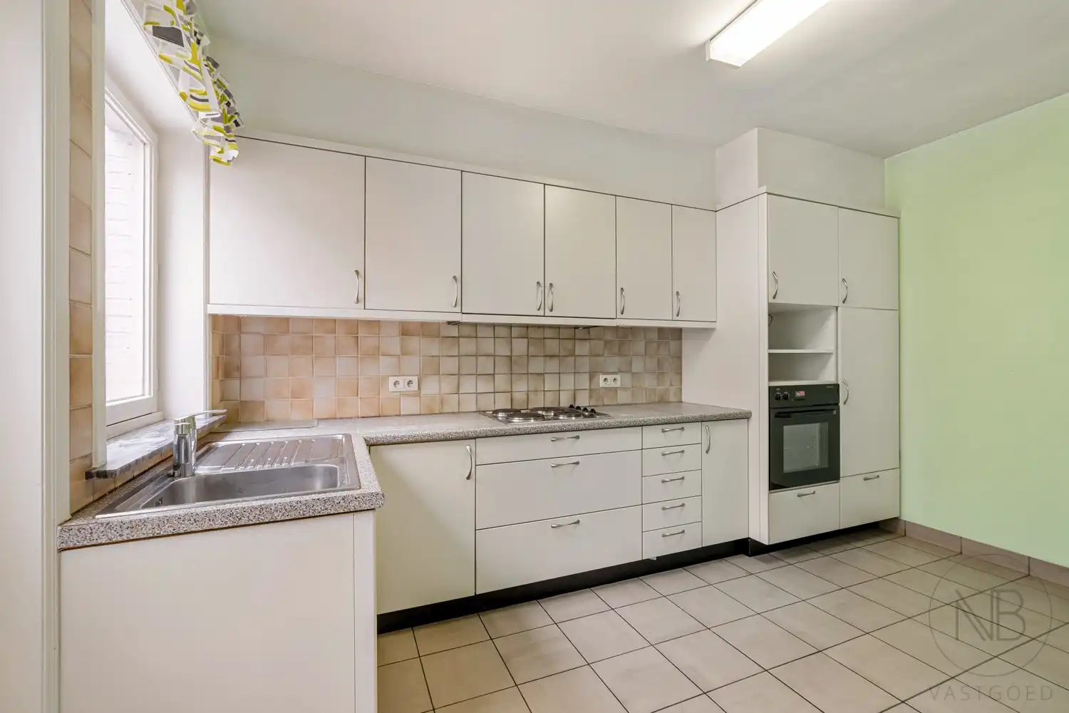 Woning met  bouwgrond te koop aan De Maten in Genk foto 19