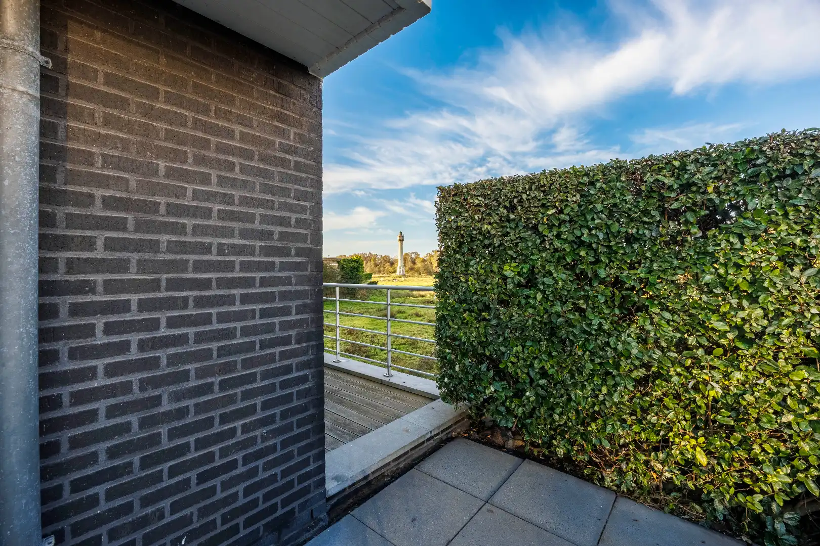 Gelijkvloers appartement met uitzonderlijk zonnig terras en zicht op natuurgebied, op een boogscheut van de zeedijk te Heist. foto 10