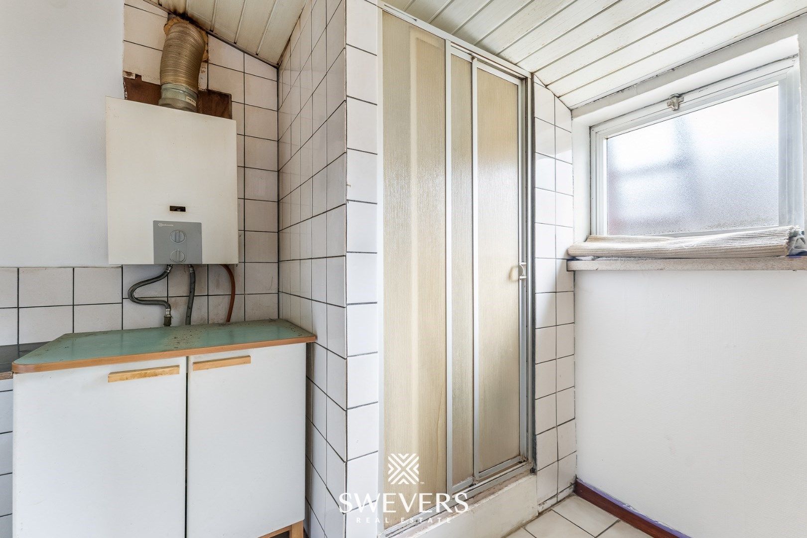 Charmante halfopen woning met renovatiepotentieel in Sint-Truiden foto 17
