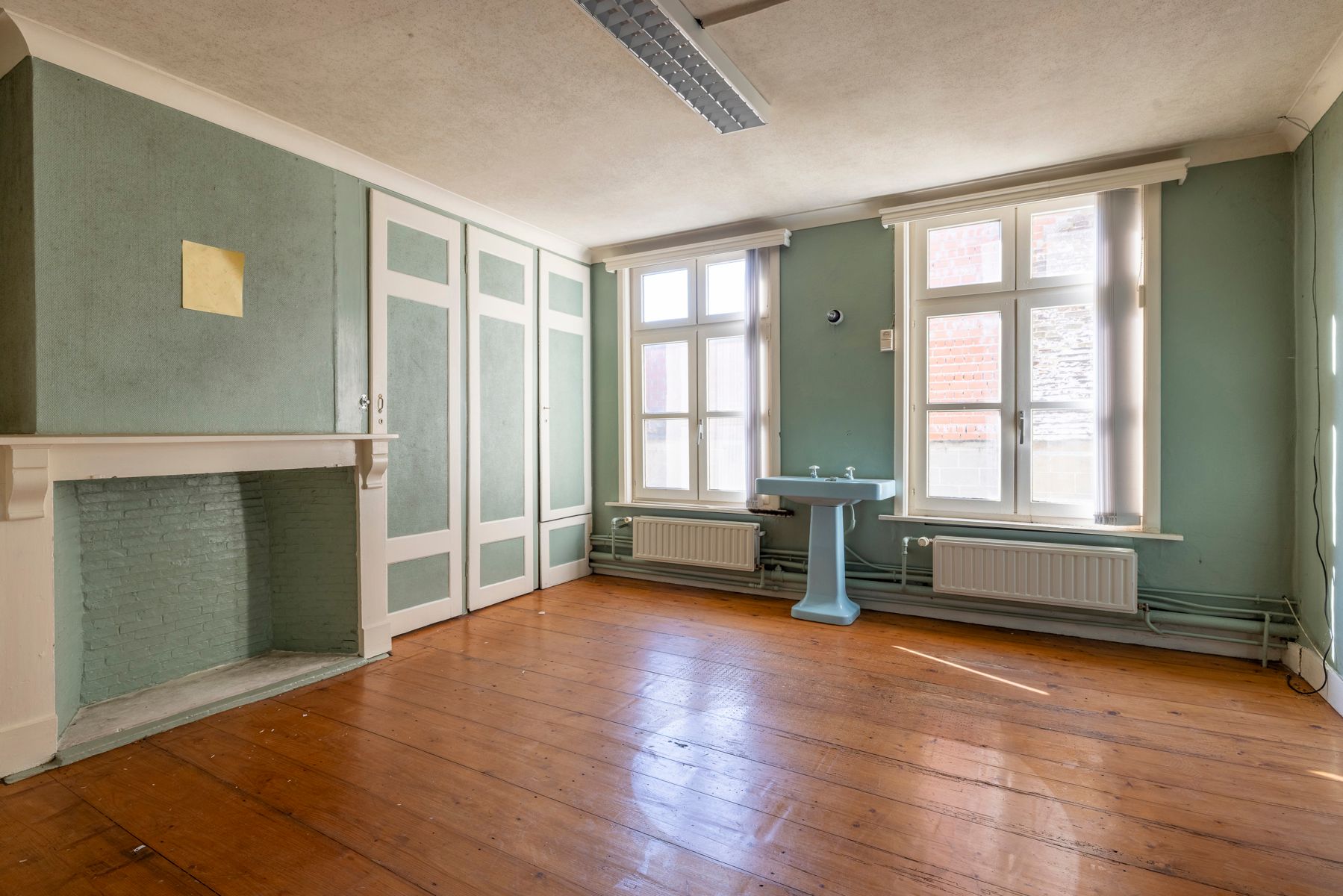 Te renoveren herenwoning met 5 tot 7 slpk en groot magazijn foto 10