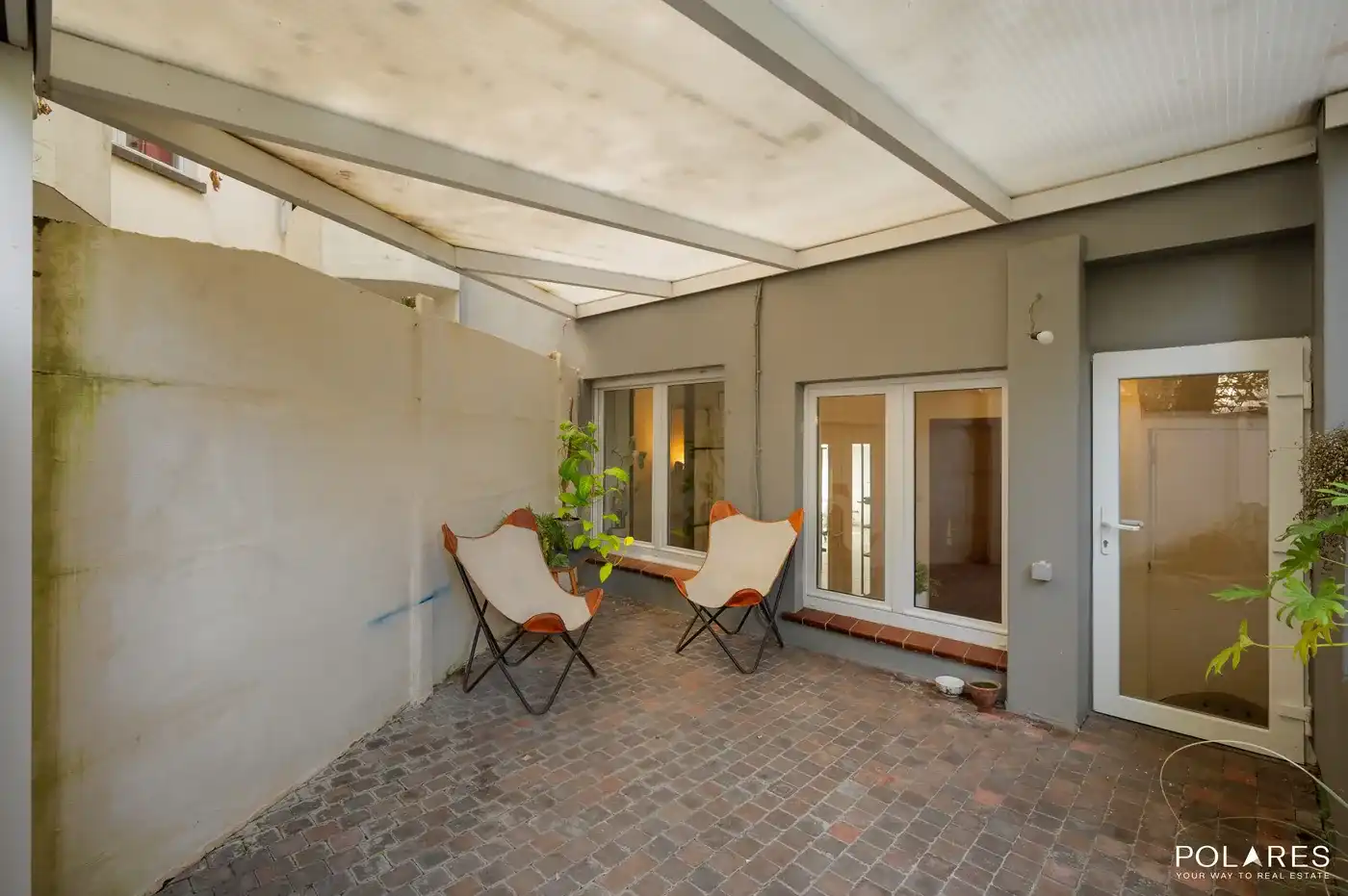 Gelijkvloers appartement met prachtige tuin én polyvalent bijgebouw! foto 12
