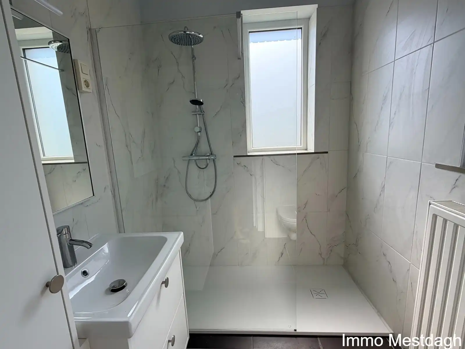 Prachtig gerenoveerd gelijkvloers appartement met terras en tuin in centrum Rummen foto 3
