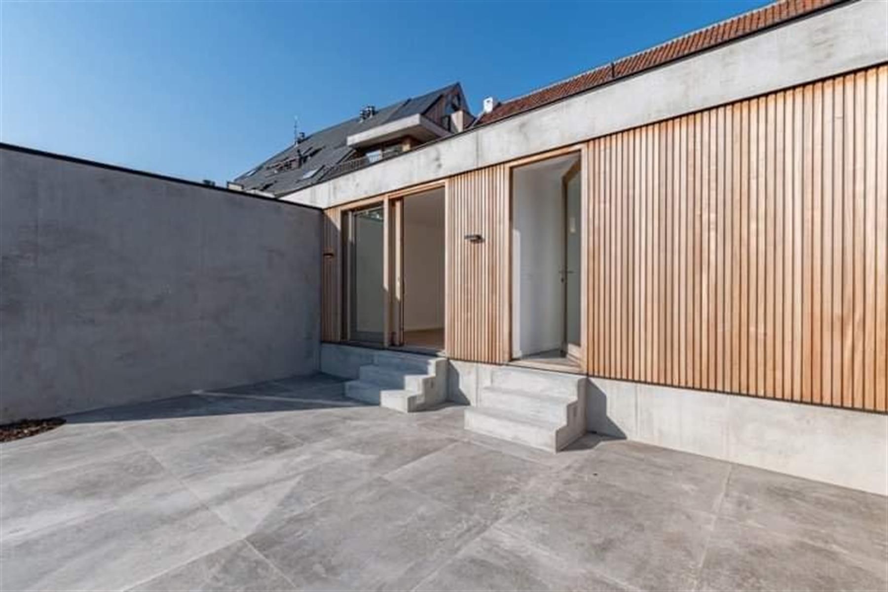 Karaktervol gelijkvloers  appartement met patio en terras foto 19