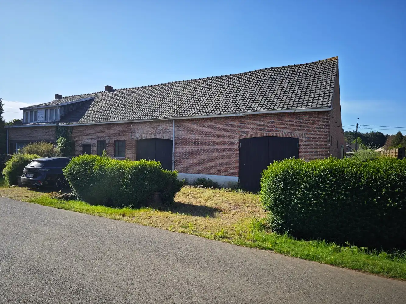 Te renoveren langgevelhoeve + langsliggend perceel bouwgrond voor open bebouwing. foto 18