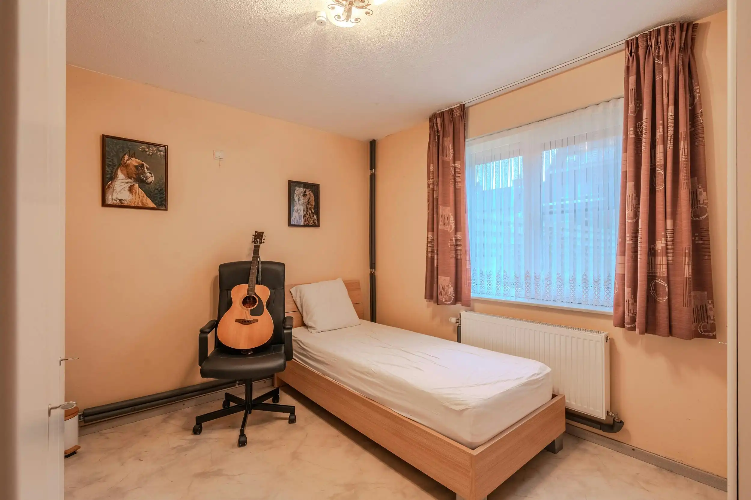 Instapklare rijwoning met zonnige tuin te Oostende foto 11