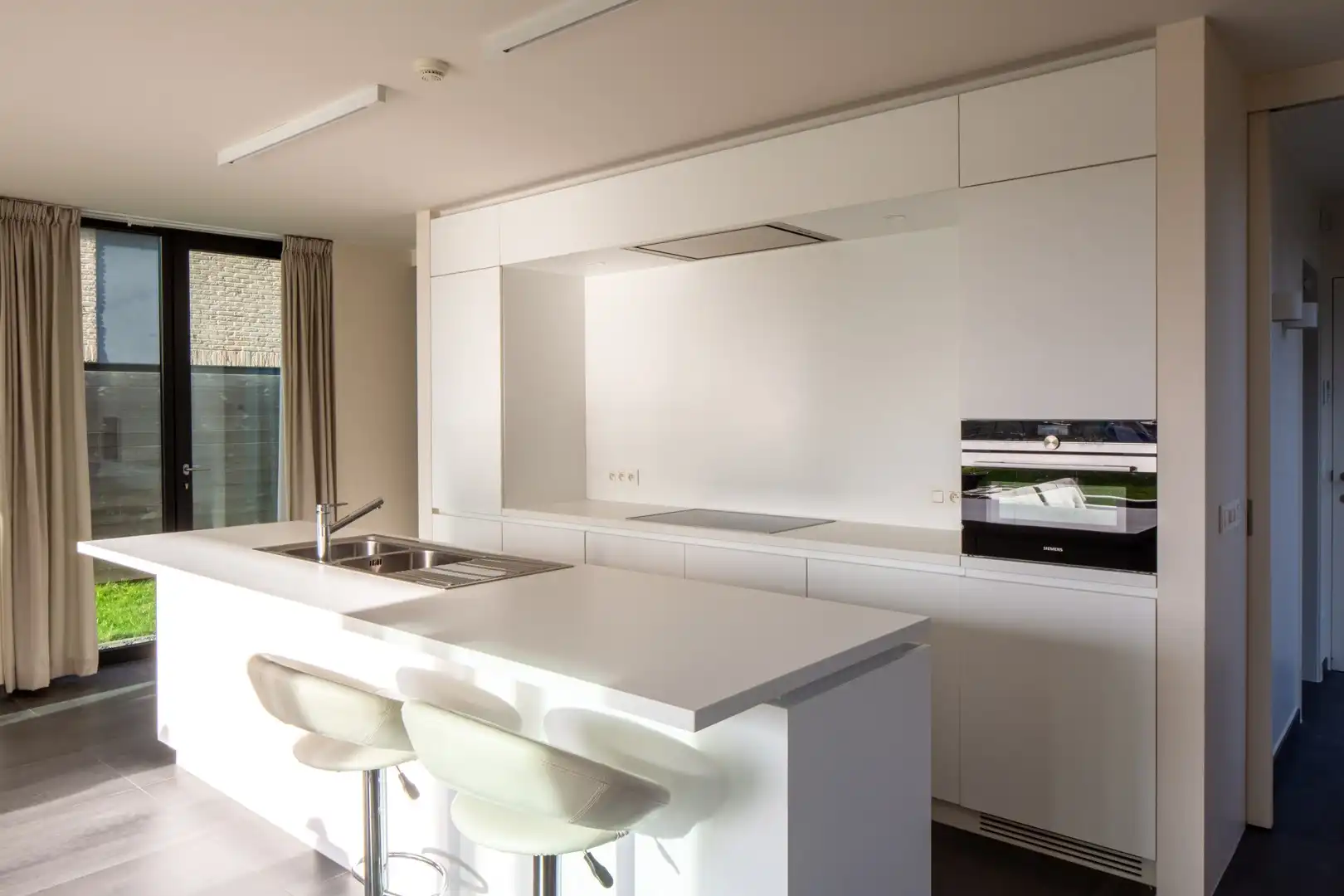 Nieuwbouw duplexappartement met tuin op strategische locatie foto 5