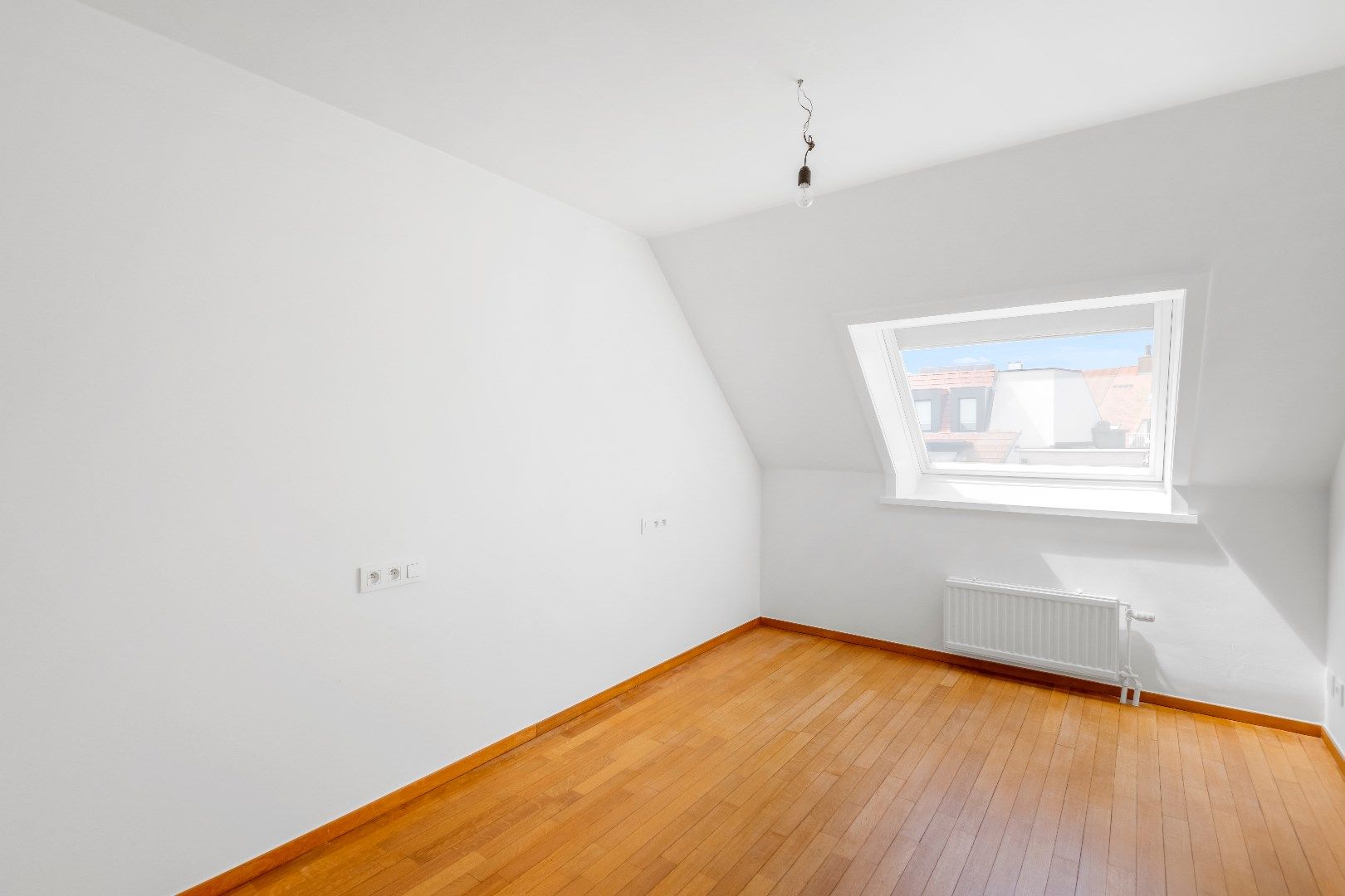 Duplex dakappartement met drie slaapkamers en zonnige terrassen gelegen vlakbij in de Dumortierlaan. foto 15