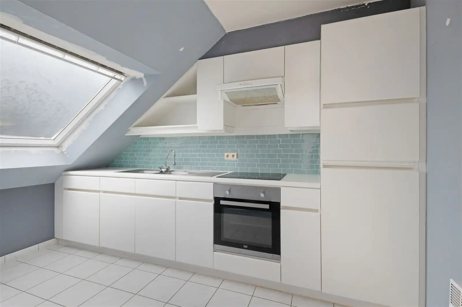 Lichtijke penthouse met terras en garagebox foto 4