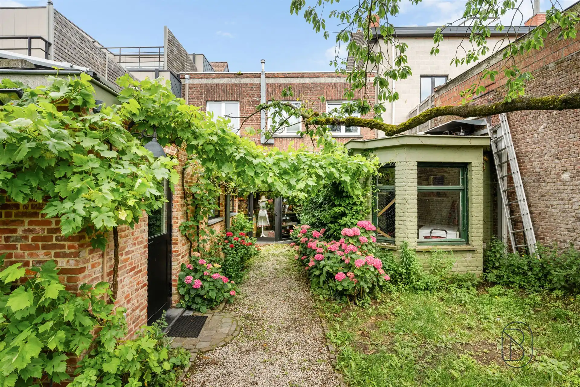 Charmant handelspand met achterliggende nieuwbouwwoning foto 10