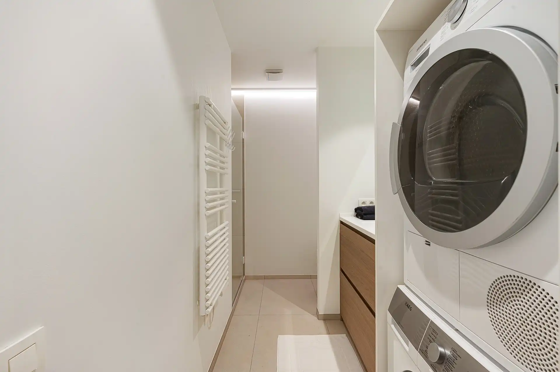Exclusief gerenoveerd hoekappartement met 3 slaapkamers en riant zonneterras van 40 m² foto 30