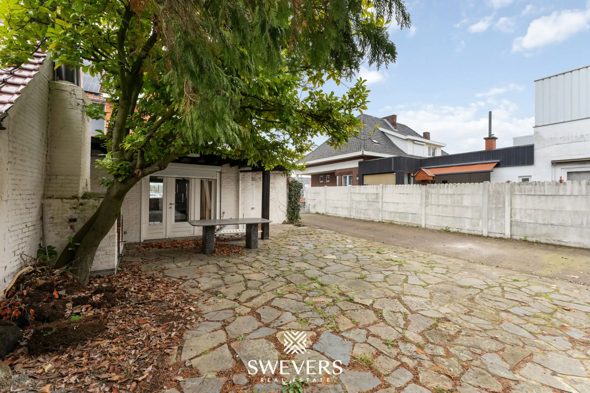 Ruime gezinswoning met multifunctionele loods op commerciële toplocatie foto 28