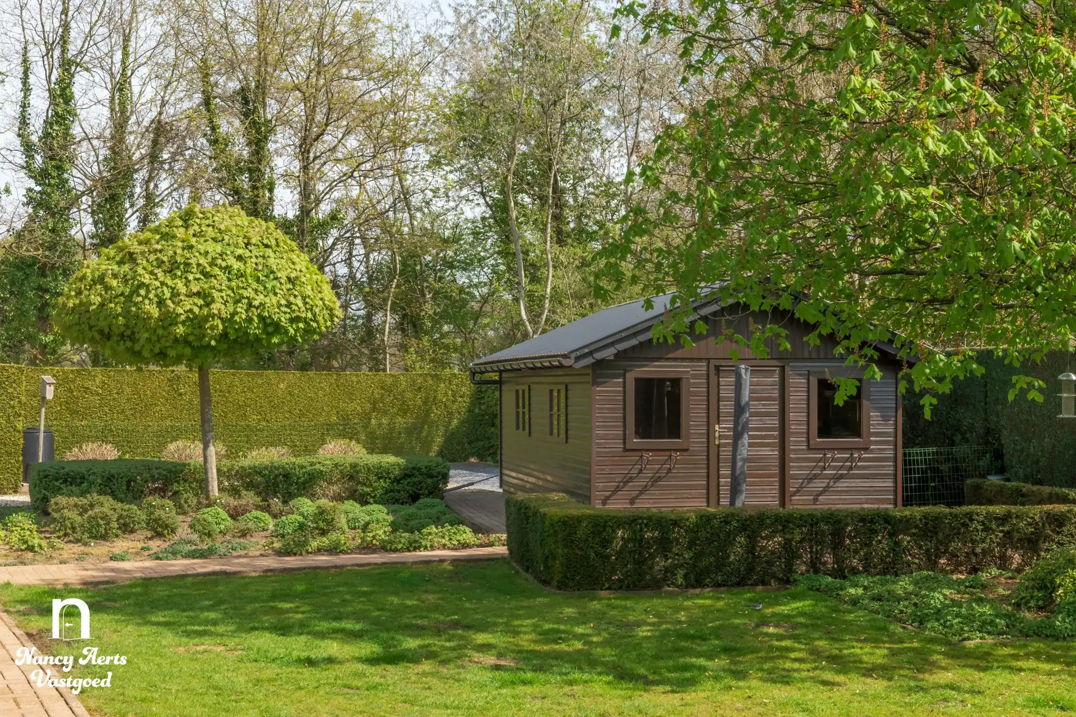 Lichtrijke woning met prachtige tuin en groeipotentieel foto 25