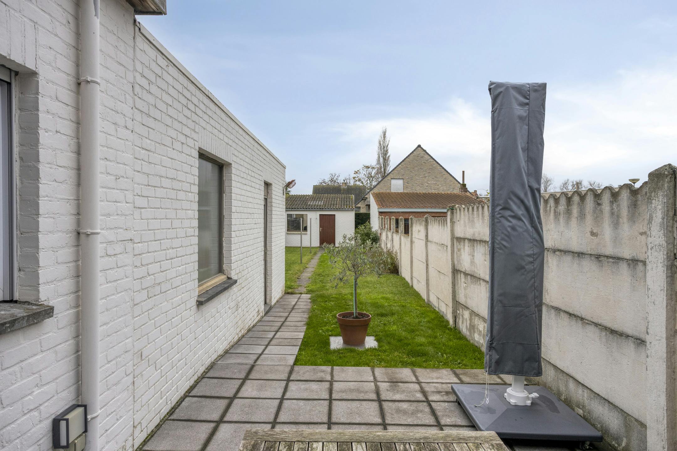 Instapklare woning met 3 slaapkamers, 2 badkamers, zuidgerichte tuin en garage. foto 21
