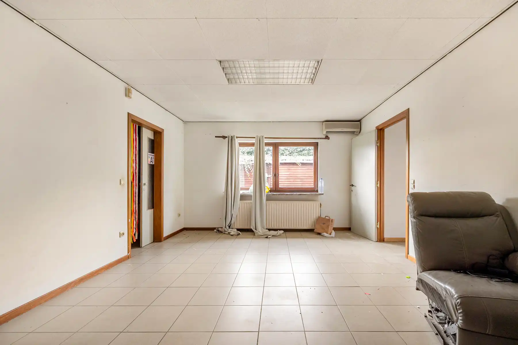 Opbrengsteigendom met 2 appartementen en handelsruimte foto 8