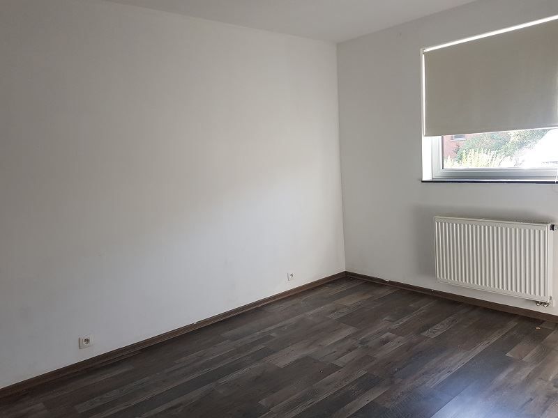 Gezellig gelijkvloers appartement met tuin, autostaanplaats en kelderberging foto 4