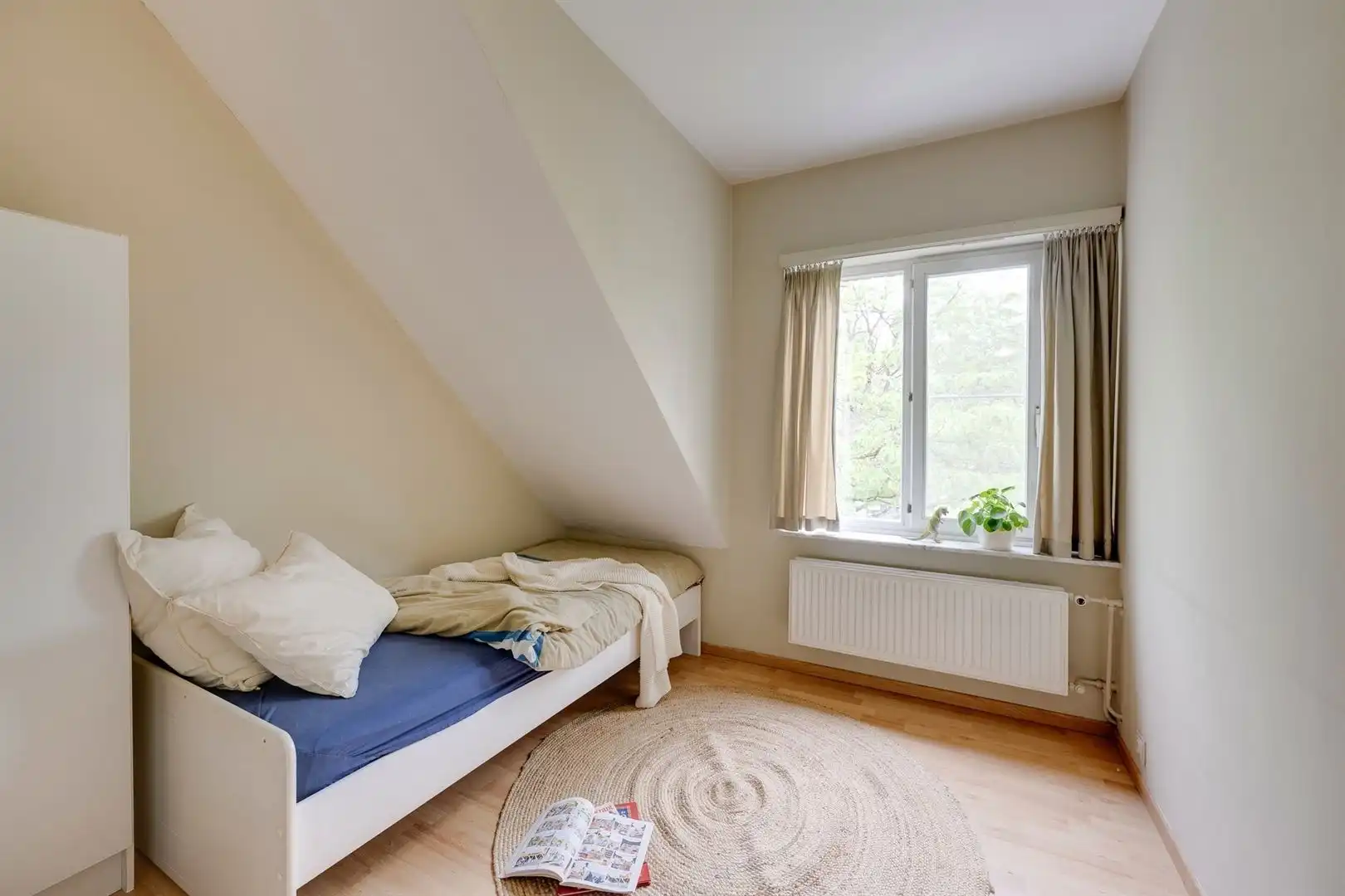 Toffe gezinswoning met 4 slaapkamers, 2 badkamers, garage en tuin foto 19