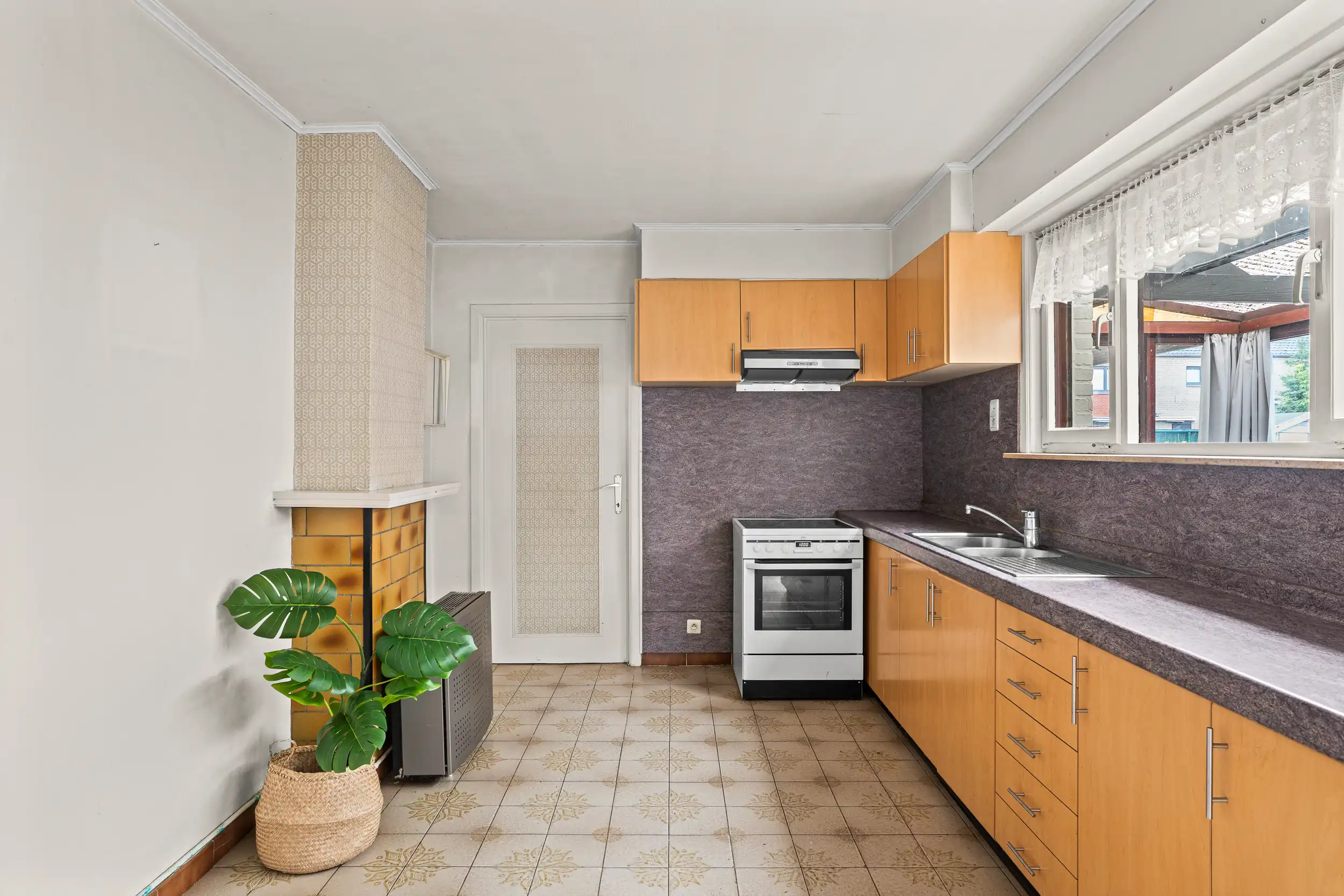 Gezinswoning met 3 slaapkamers en potentieel! foto 6