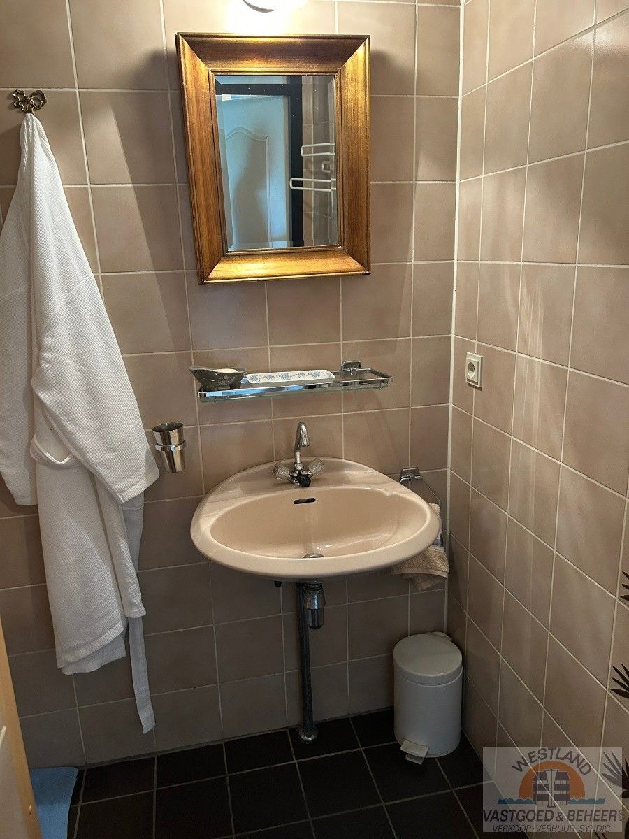 Gelijkvloers appartement met drie slaapkamers foto 12