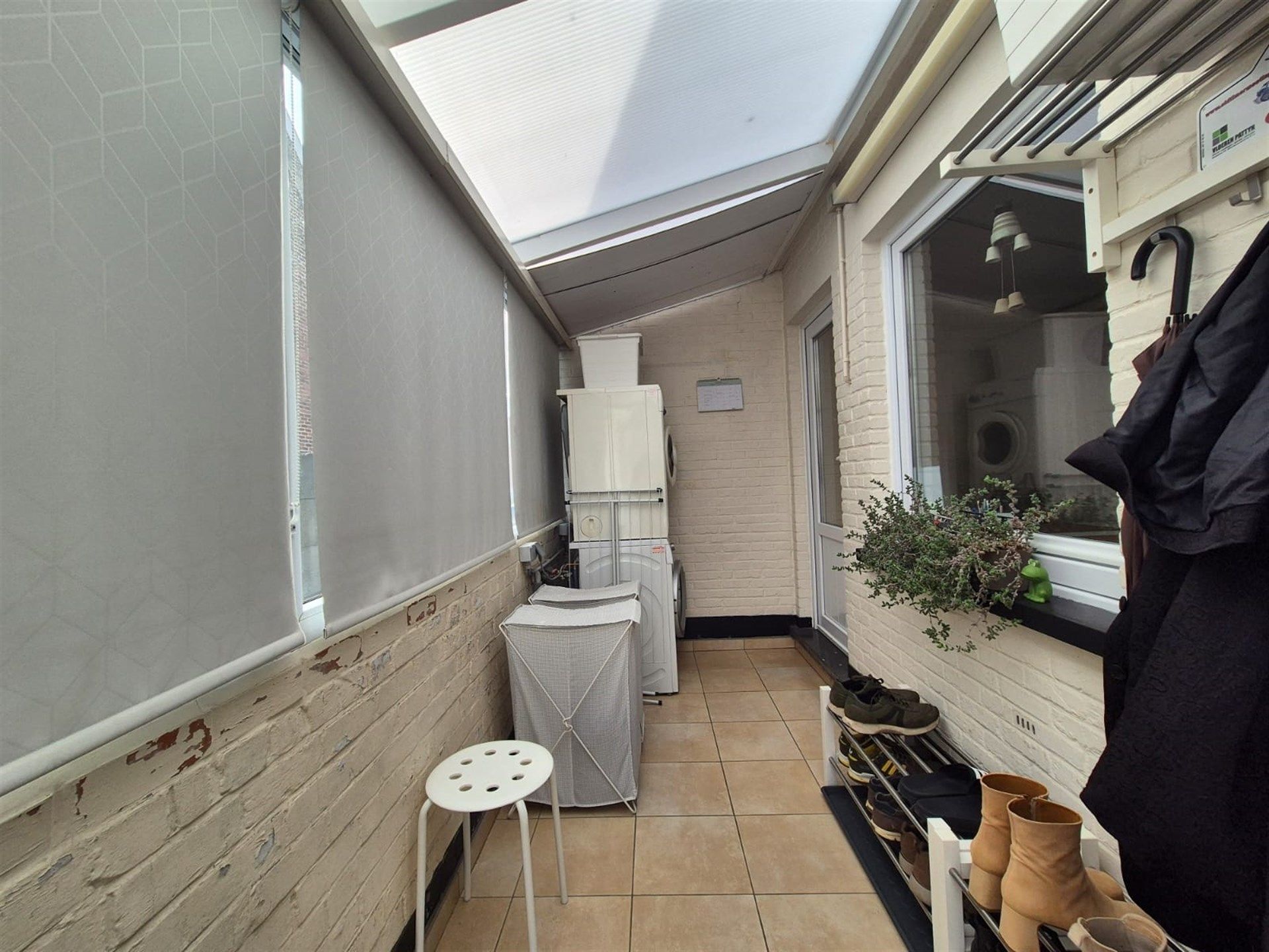 Knusse woning met tuin en garage.  foto 16