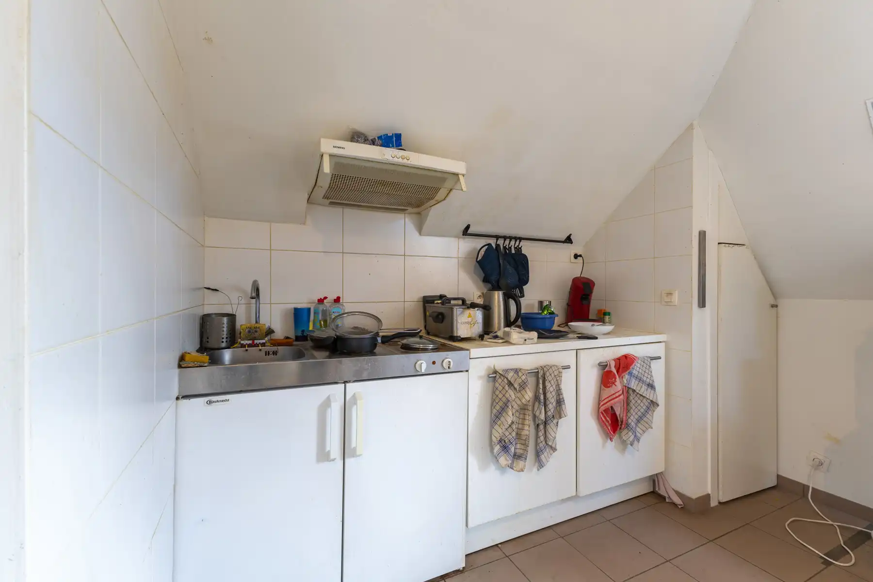 Opbrengsteigendom met 4 wooneenheden en 2 garages foto 42