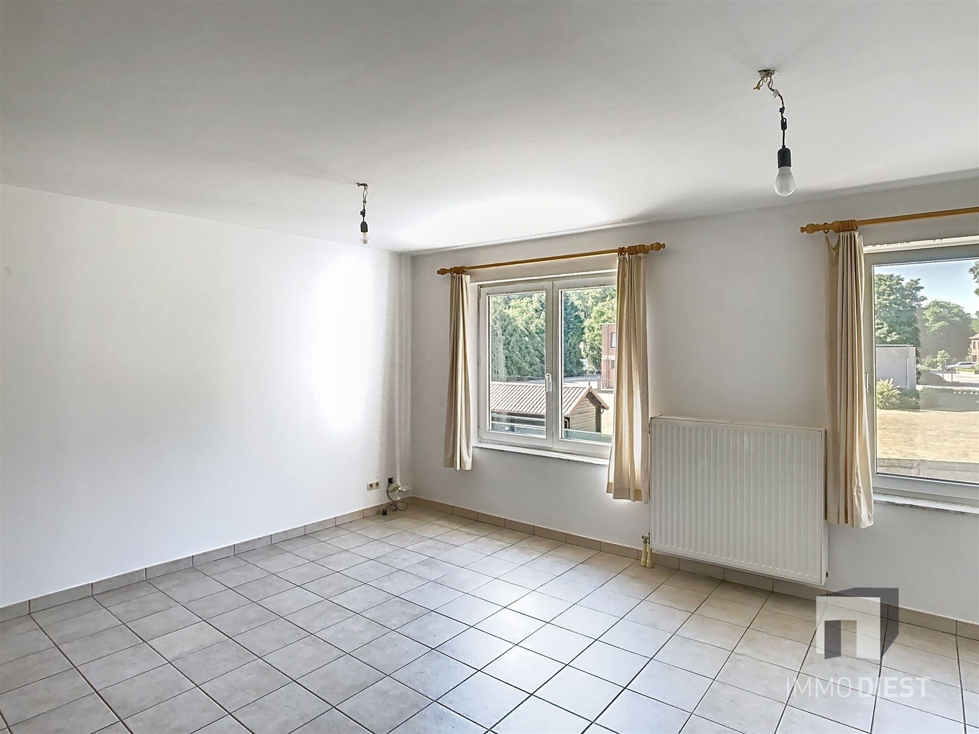 Triplex met 2 slaapkamers en inpandige garage foto 4
