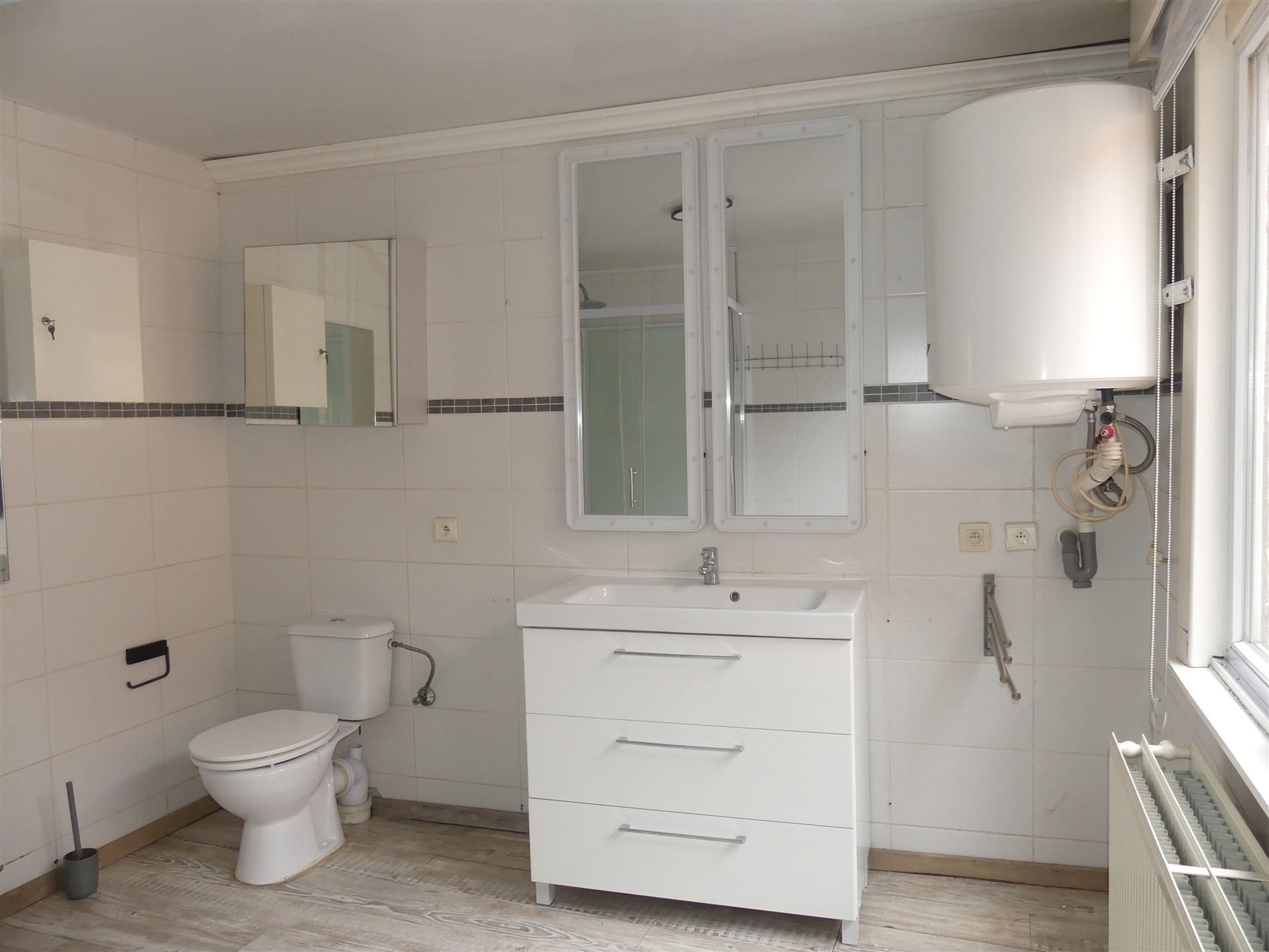 Opbrengstwoning bestaande uit 2 appartementen! foto 11