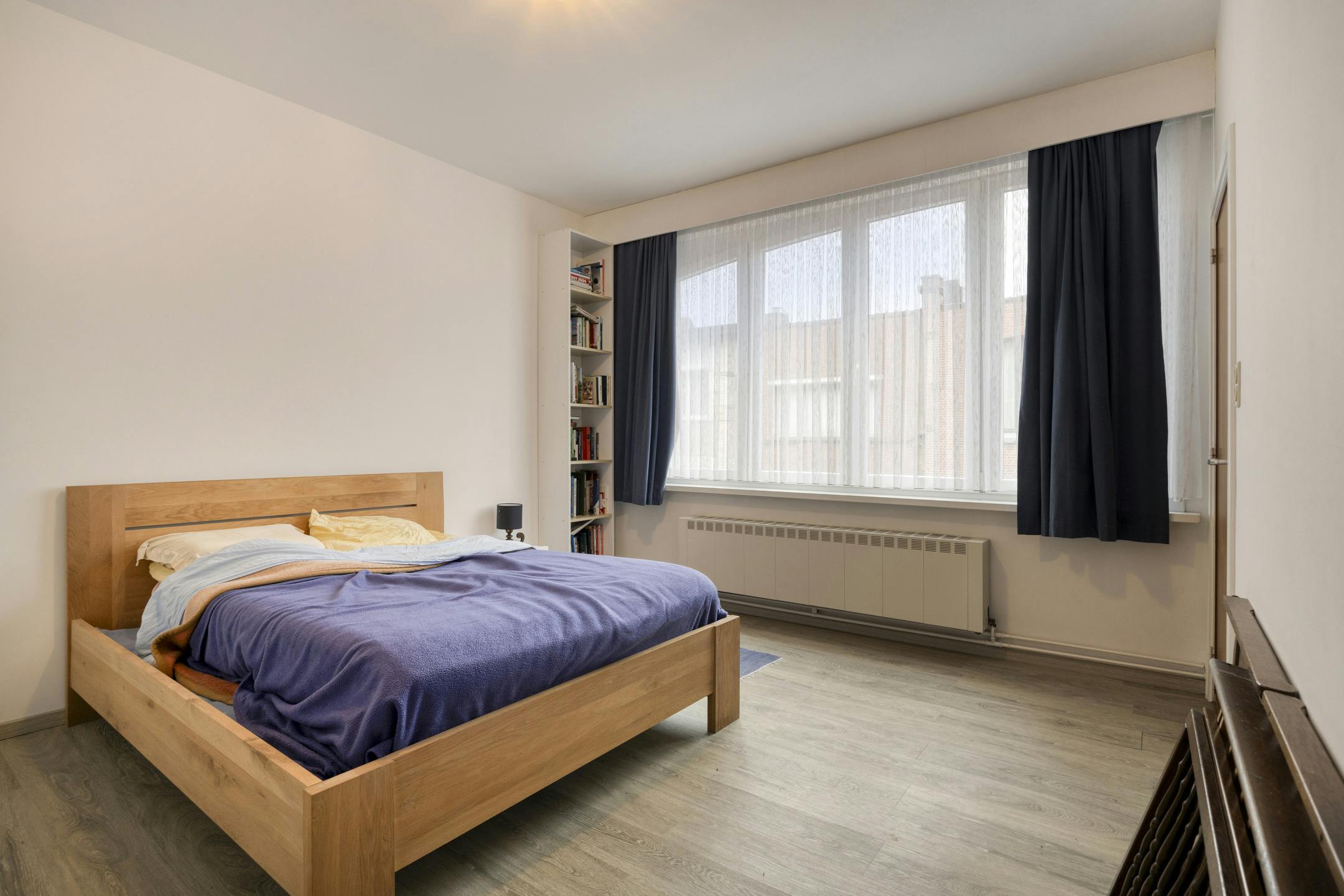 Ruim huis te koop Merksem met garage en zonnige tuin foto 10