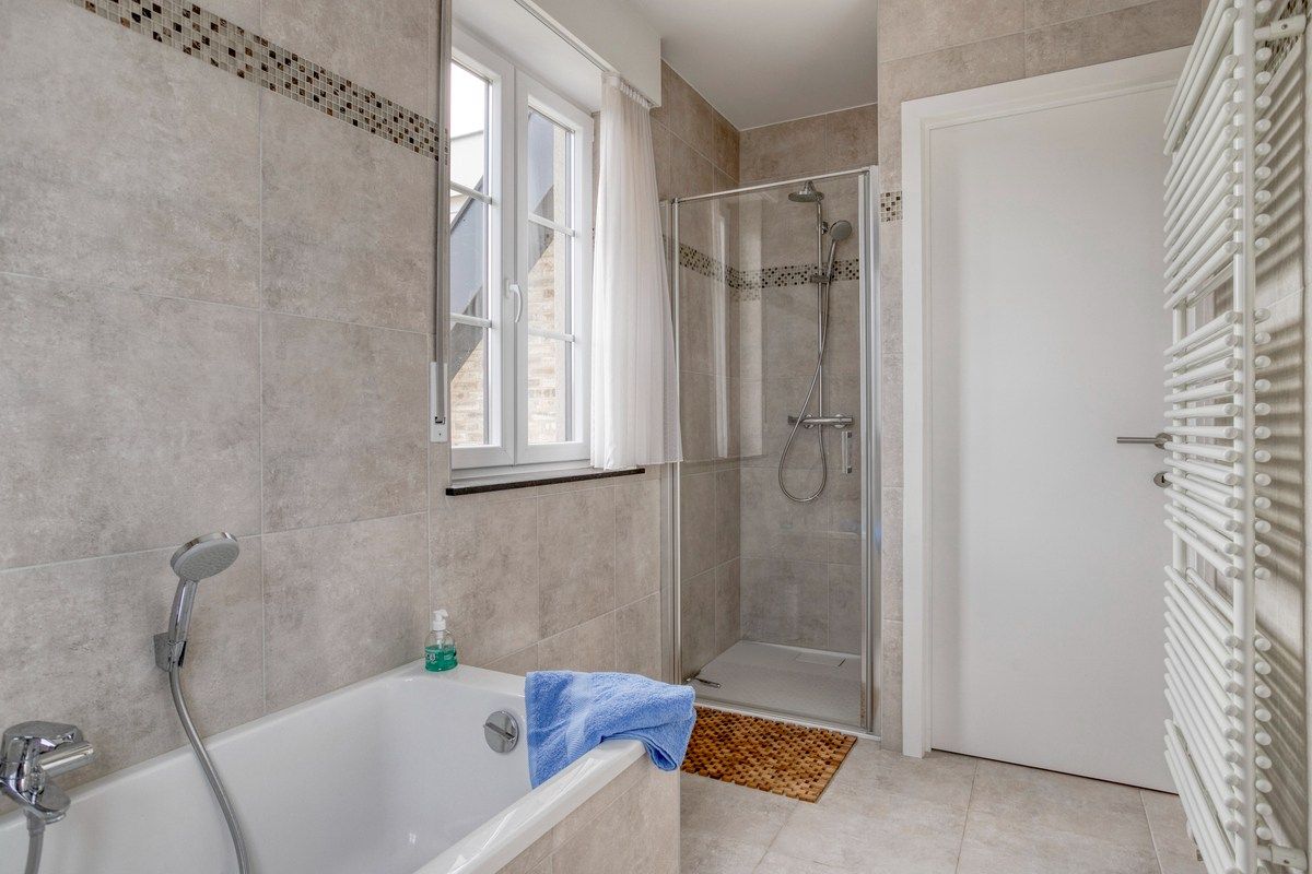 Recente halfopen woning met 4 slaapkamers en garage! foto 13