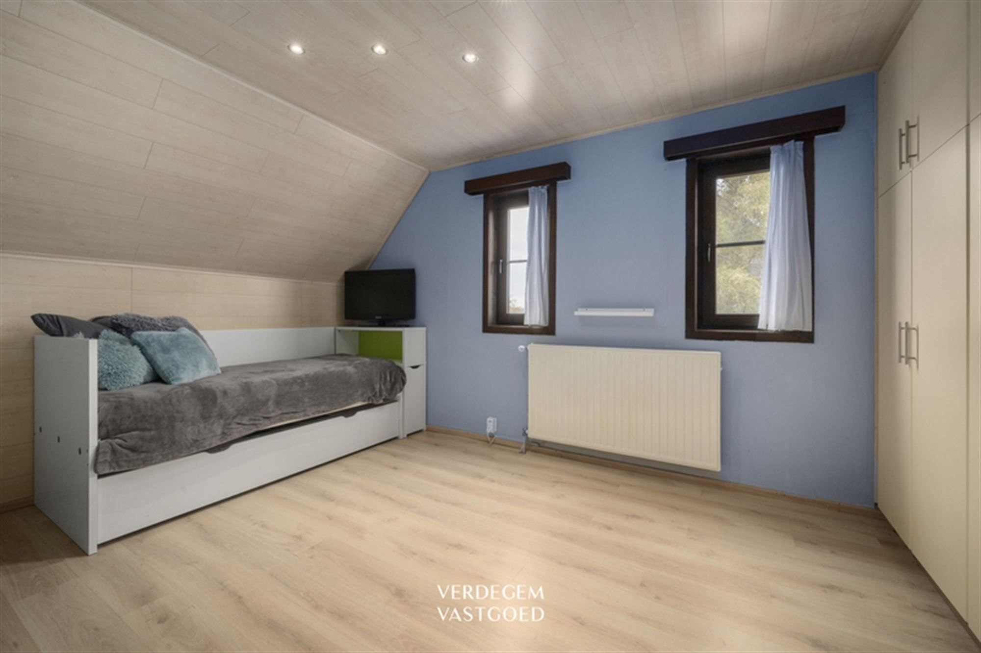 Verrassend ruime woning met 3+1 slaapkamers en heerlijke veranda foto 16