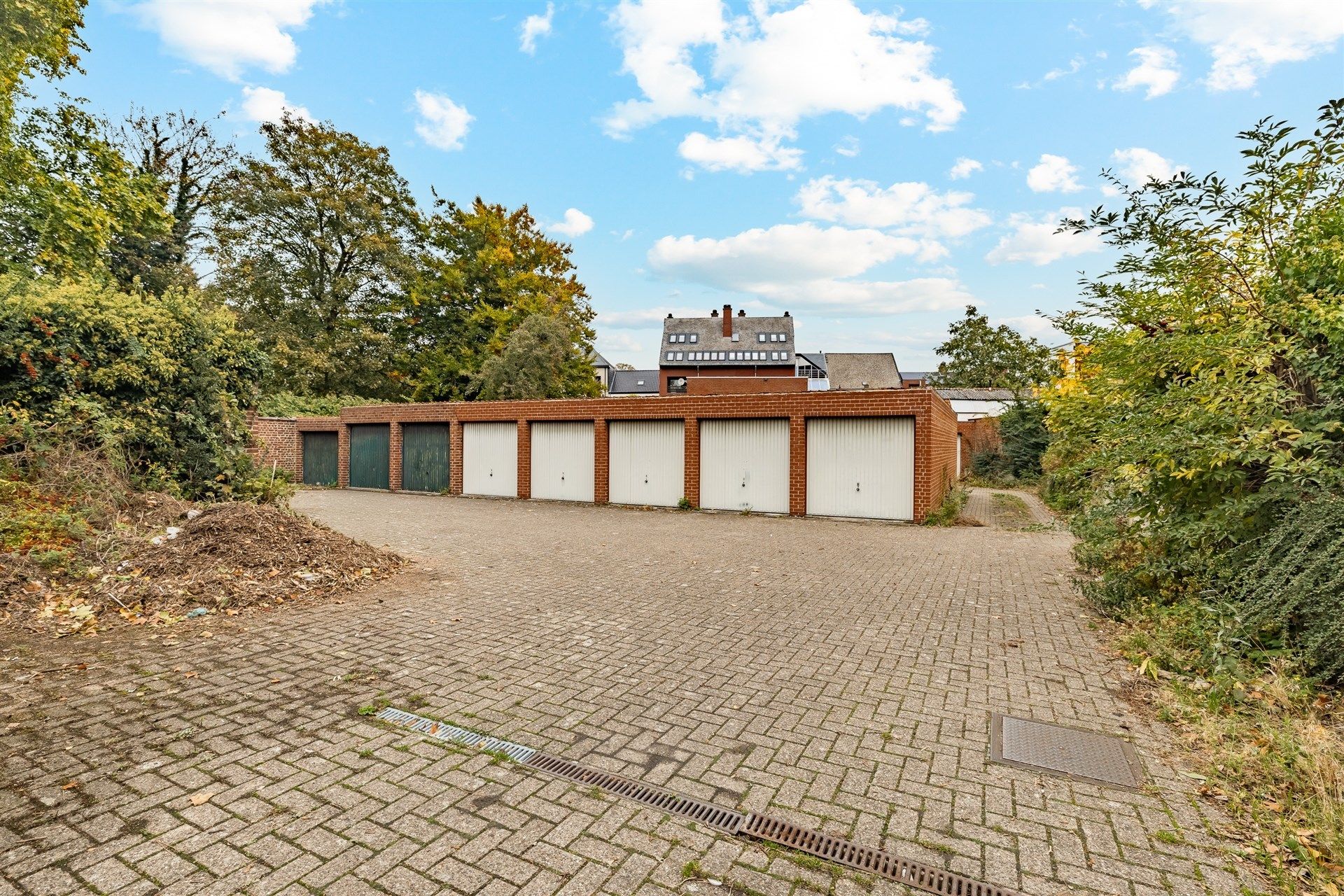 Opbrengsteigendom bestaande uit 4 appartementen + 22 garageboxen + magazijn/werkplaats foto 21